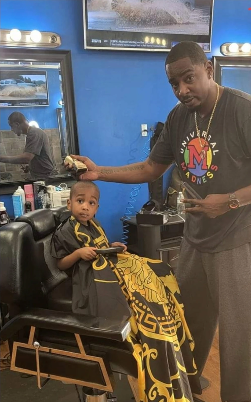 Portrait of Stretch, co-owner of 2 Elite Barber Shop.
